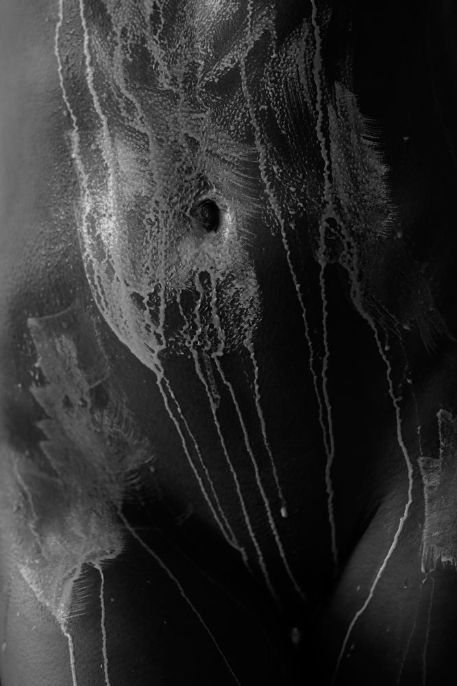Abstract fine art photograph of textured skin and water, black and white